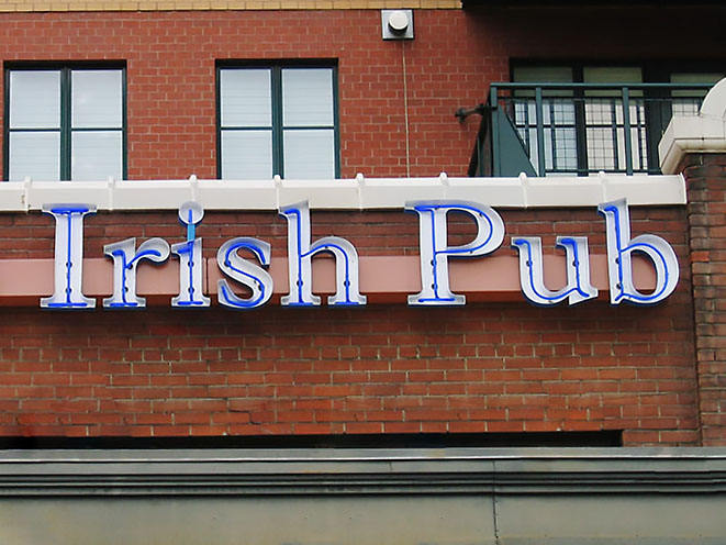 a sign on a brick building