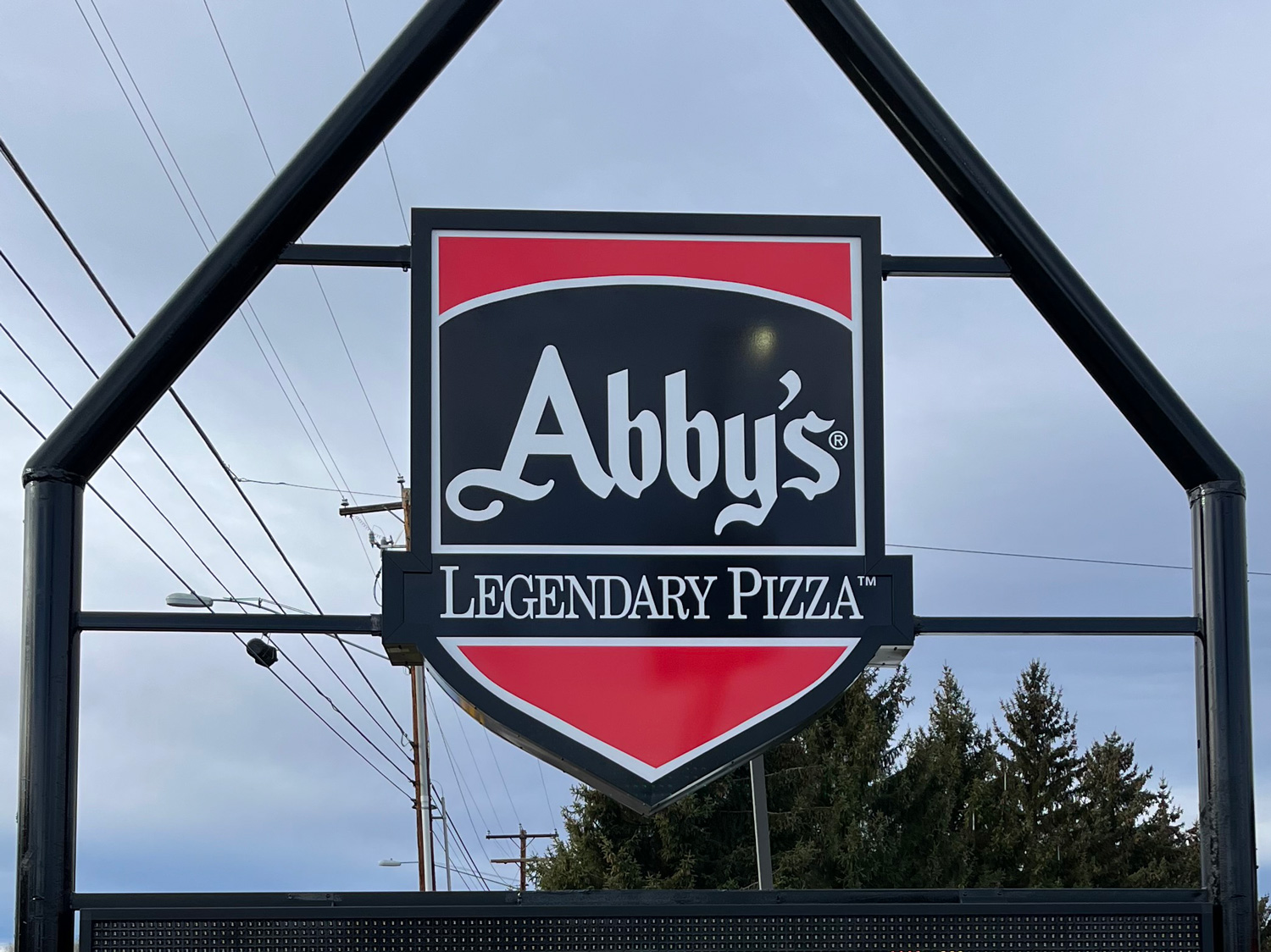 a sign on a metal pole